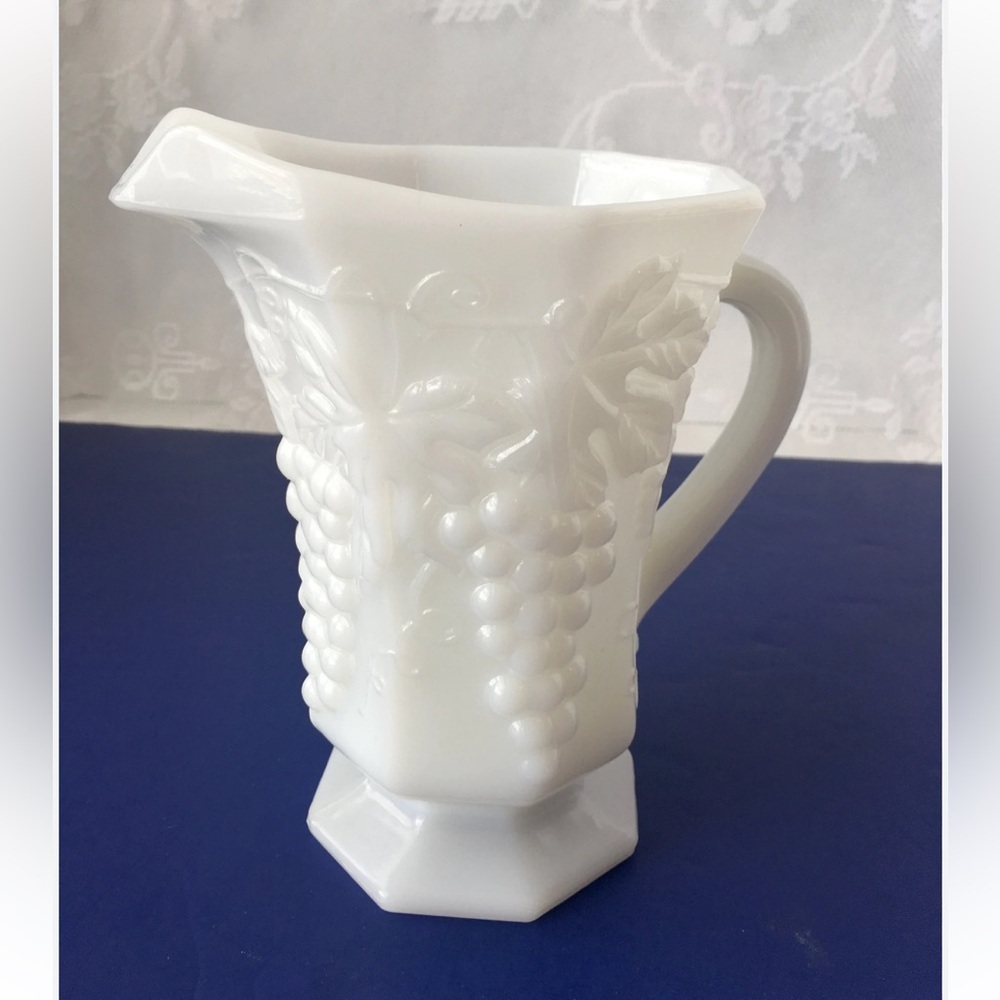 Vintage Anchor Hocking white milk glass pitcher 
embossed grape leaf pattern